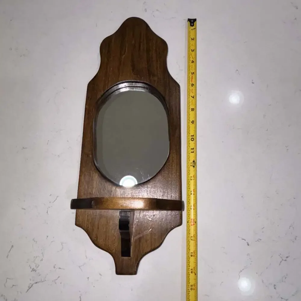 Vintage Wall-Mounted Dark Wood Sconce with Oval Mirror and Shelf